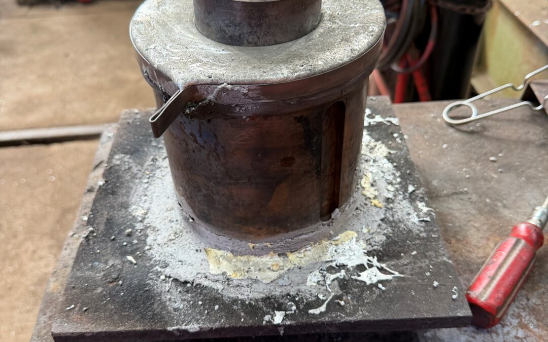 Work continues on the rod bearings for the chassis of 4561 at Williton.